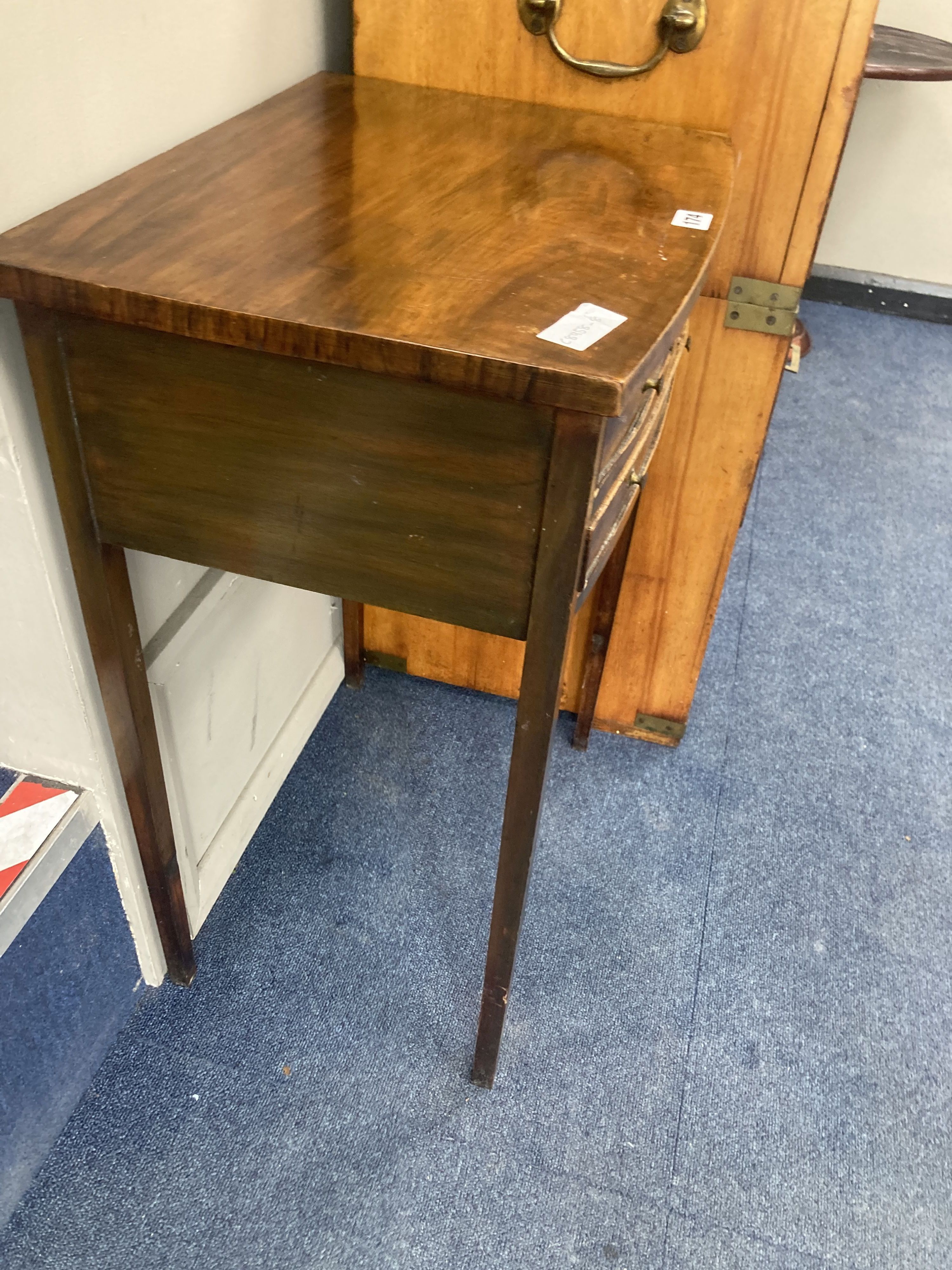 A George III style mahogany side table, fitted one long and two small drawers, width 48cm, depth 37cm, height 68cm